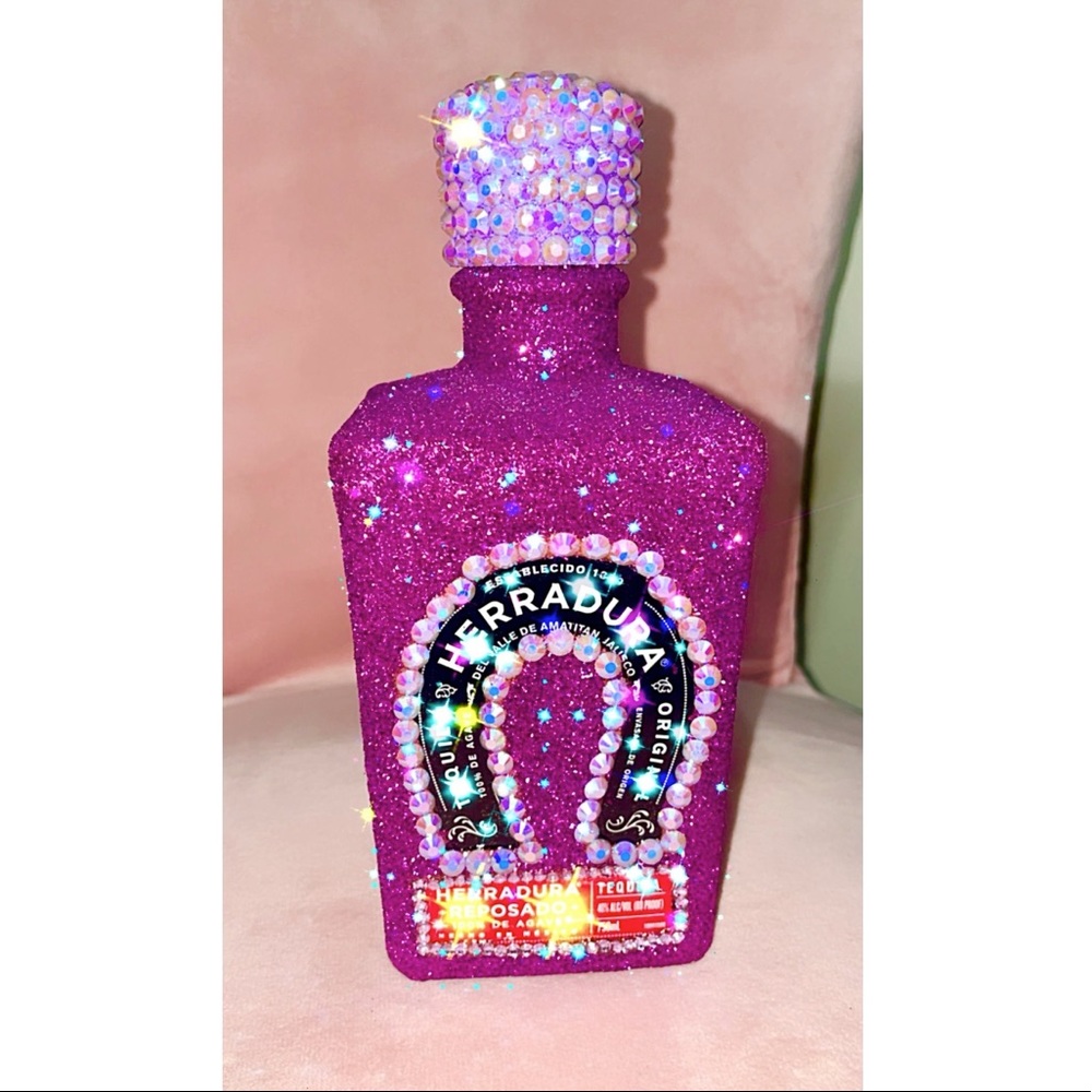 Empty Herradura tequila bedazzled bottle